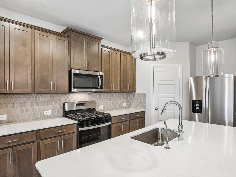Photo is not of the actual home, but is an inspirational photo of builder’s model home and may depict options, furnishings, and/or decorator features that are not included