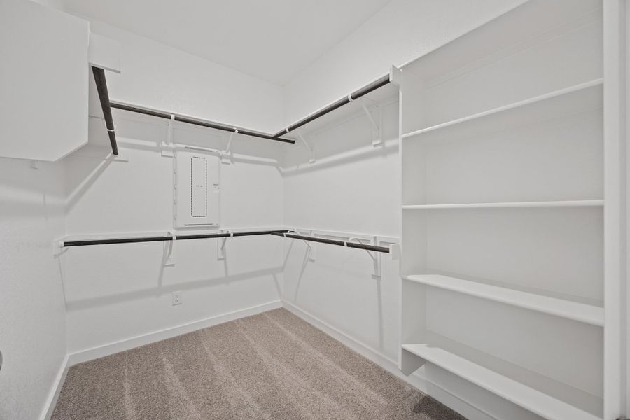 Primary Closet in the Colorado home plan by Trophy Signature Homes – REPRESENTATIVE PHOTO Primary Closet in the Colorado home plan by Trophy Signature Homes – REPRESENTATIVE PHOTO