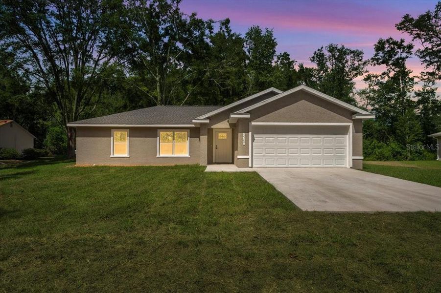 Front exterior of a new home in , Ocala, FL, highlighting curb appeal (Image 20).