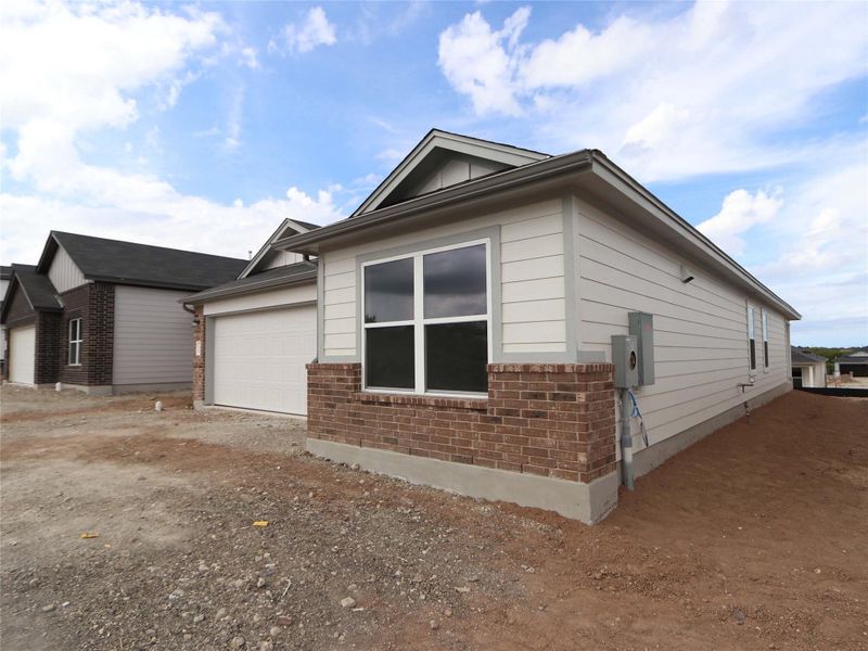 Exterior details and patio area of a home in Marble Creek Crossing, Austin (Image 2). Exterior details and patio area of a home in Marble Creek Crossing, Austin (Image 2).