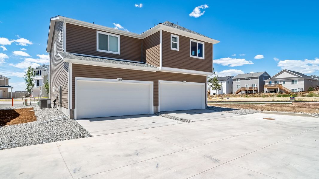 Front exterior of a new home in Banning Lewis Ranch - New Homes Colorado Springs, Colorado Springs, CO, highlighting curb appeal (Image 21). Front exterior of a new home in Banning Lewis Ranch - New Homes Colorado Springs, Colorado Springs, CO, highlighting curb appeal (Image 21).