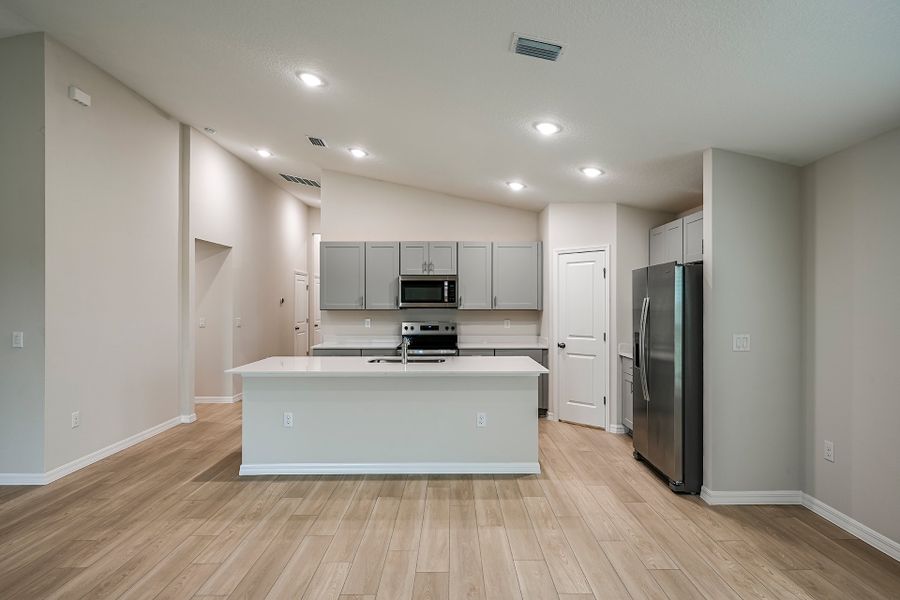 Furnished interior view inside a new home in Scenic Terrace, Haines City (Image 19).