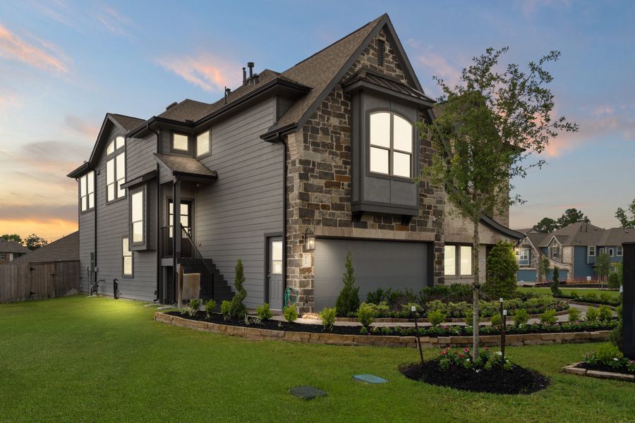 Front exterior of a new home in Woodforest, Montgomery, TX, highlighting curb appeal (Image 24). Front exterior of a new home in Woodforest, Montgomery, TX, highlighting curb appeal (Image 24).