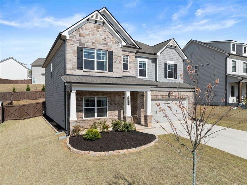 Front exterior of a new home in , Gainesville, GA, highlighting curb appeal (Image 22).