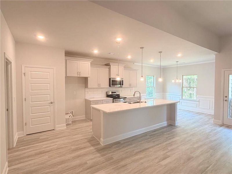 Furnished interior view inside a new home in Magnolia Villas, Cornelia (Image 9).