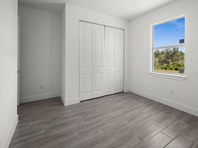 Spacious, unfurnished interior of a new home in , Port Charlotte (Image 28).