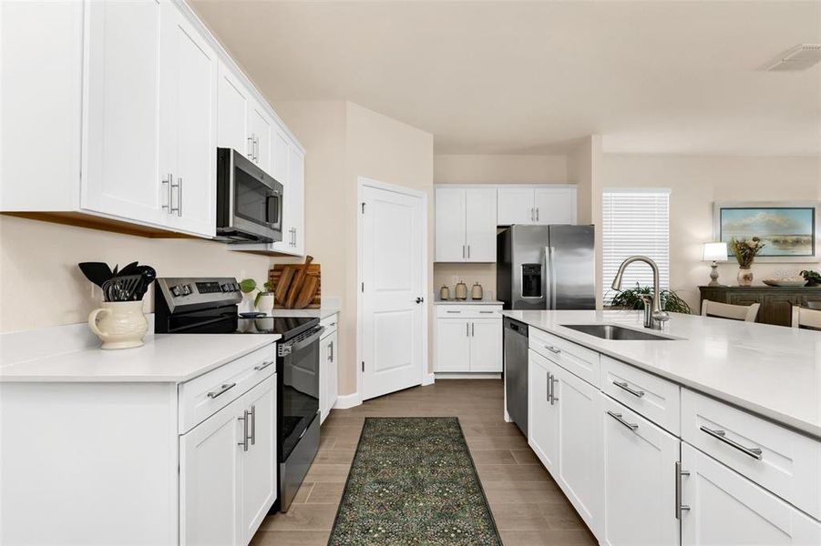 Furnished interior view inside a new home in Palm Lake at Coco Bay, Englewood (Image 19). Furnished interior view inside a new home in Palm Lake at Coco Bay, Englewood (Image 19).