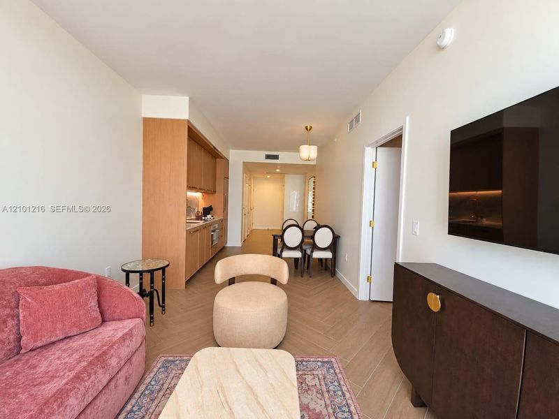Furnished interior view inside a new home in NoMad Residences, Miami (Image 9).