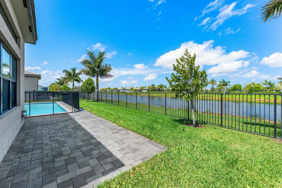 Exterior details and patio area of a home in Valencia Grand, Boynton Beach (Image 27). Exterior details and patio area of a home in Valencia Grand, Boynton Beach (Image 27).