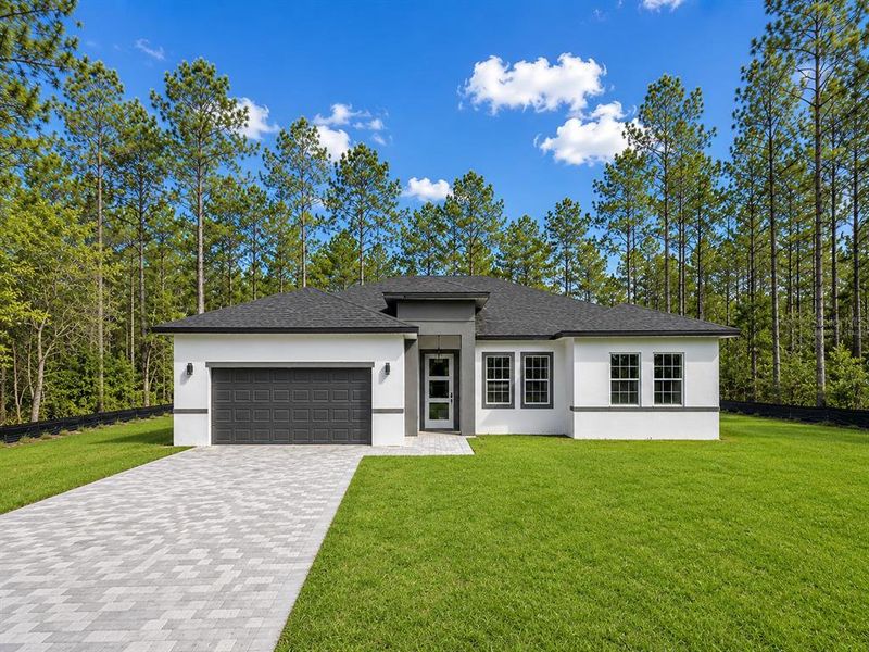 Front exterior of a new home in , Ocala, FL, highlighting curb appeal (Image 19). Front exterior of a new home in , Ocala, FL, highlighting curb appeal (Image 19).
