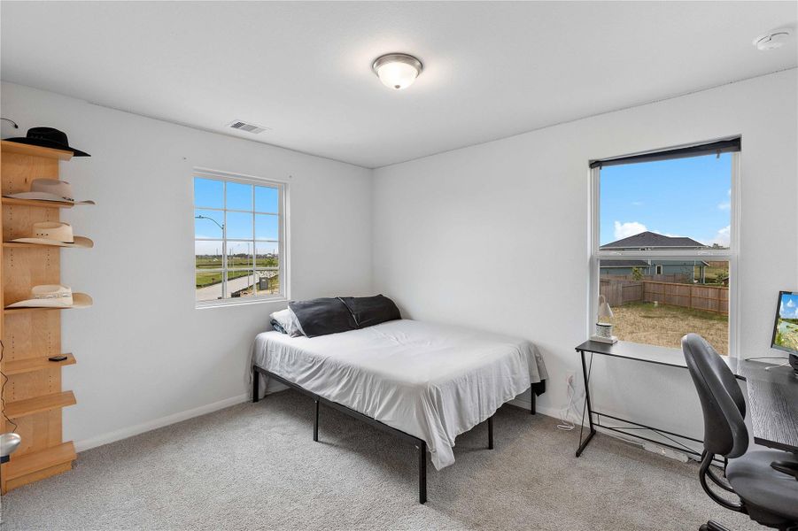 Furnished interior view inside a new home in Sweetgrass Village, Crosby (Image 37).