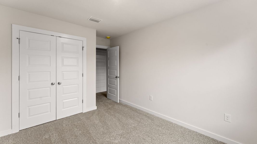 Representative unfurnished interior of a home built from the Palm Exterior by D.R. Horton in Genoa Landing Townhomes, Freeport (Image 24).
