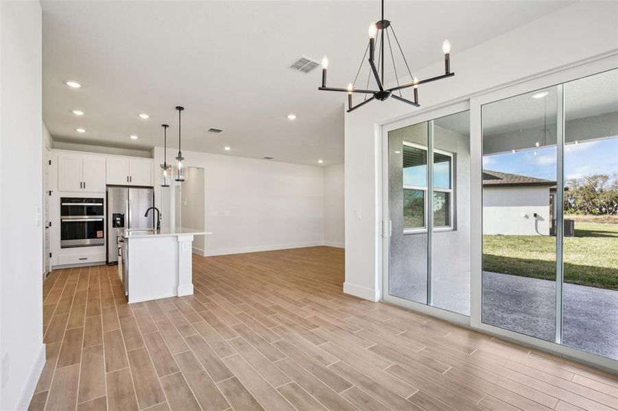 Spacious, unfurnished interior of a new home in Magnolia Bay - Reserve Series, Nokomis (Image 17).
