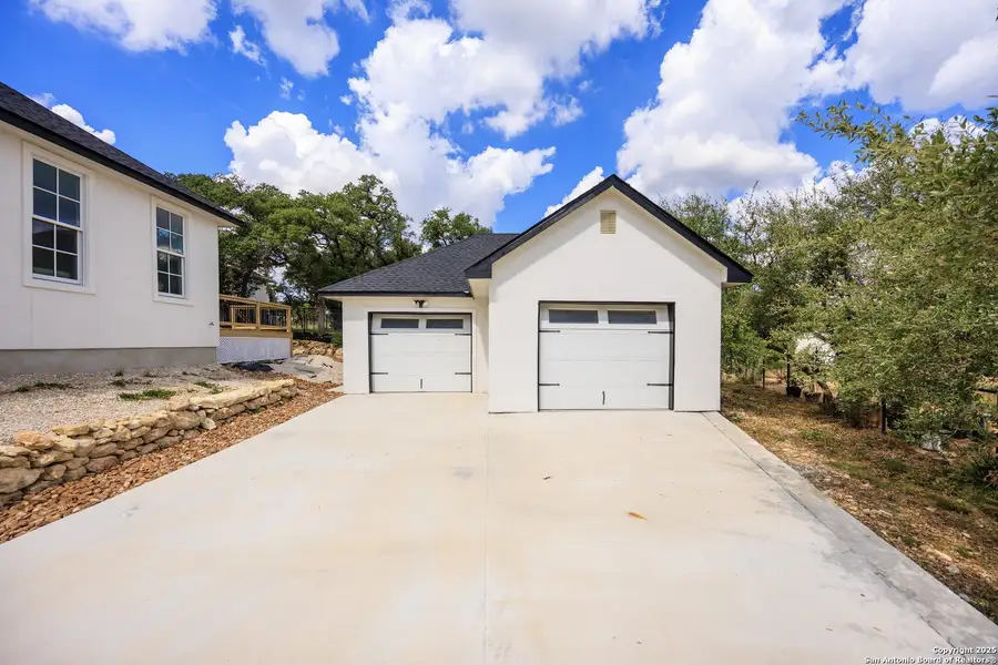 Front exterior of a new home in , Blanco, TX, highlighting curb appeal (Image 2). Front exterior of a new home in , Blanco, TX, highlighting curb appeal (Image 2).