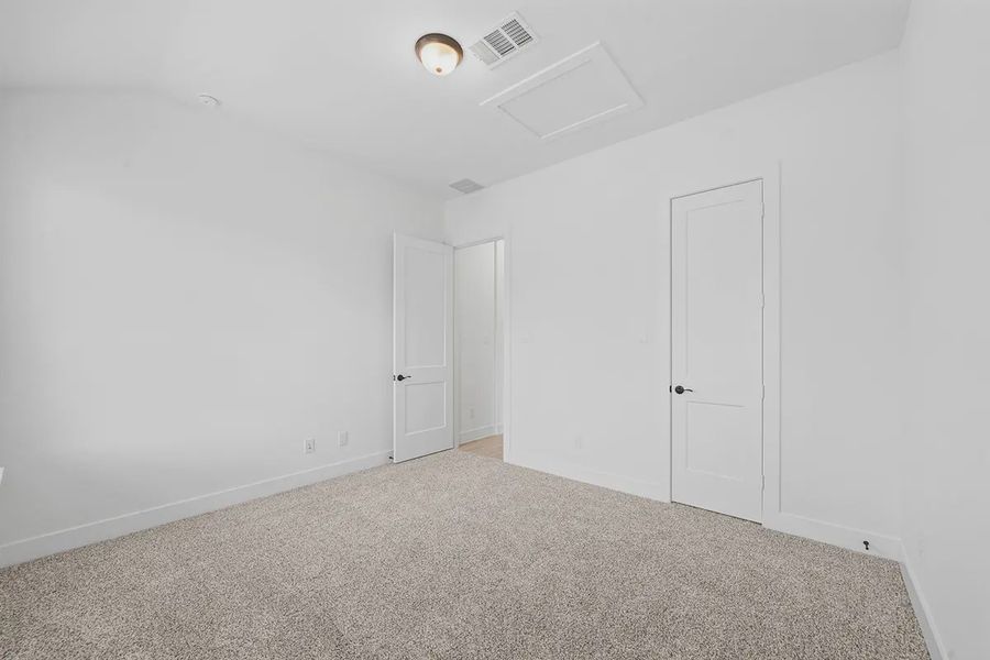 Representative unfurnished interior of a home built from the Madison by Chesmar Homes in Grange, Katy (Image 34).