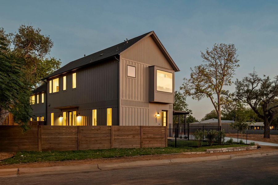 View of home featuring a fenced yard View of home featuring a fenced yard
