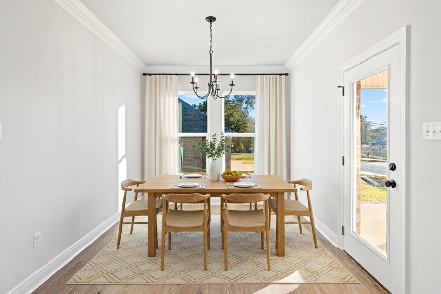 Front exterior of a new home in Eagle Pointe, Pensacola, FL, highlighting curb appeal (Image 15). Front exterior of a new home in Eagle Pointe, Pensacola, FL, highlighting curb appeal (Image 15).