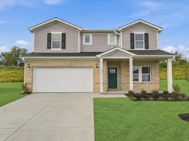 Front exterior of a new home in Ashby Woods, Boiling Springs, SC, highlighting curb appeal (Image 1). Front exterior of a new home in Ashby Woods, Boiling Springs, SC, highlighting curb appeal (Image 1).