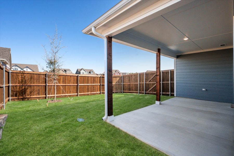 Exterior details and patio area of a home in Heritage Towne, Midlothian (Image 35).