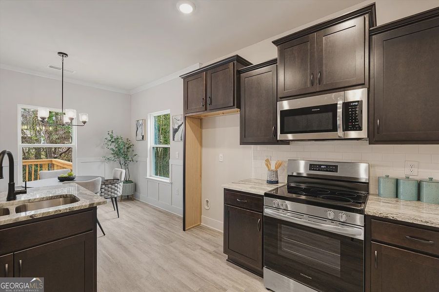 Furnished interior view inside a new home in Canterbury Villas, Carrollton (Image 6).