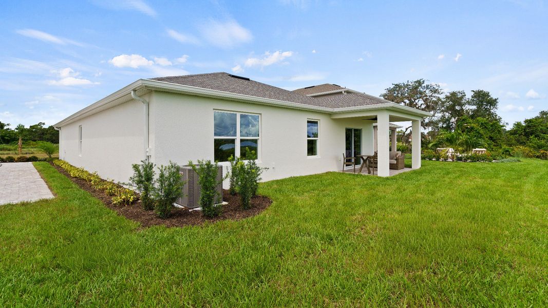 Representative exterior photo of a completed home built from the Castaway by DRB Homes in Willowbrook North, Winter Haven, FL (Image 28).