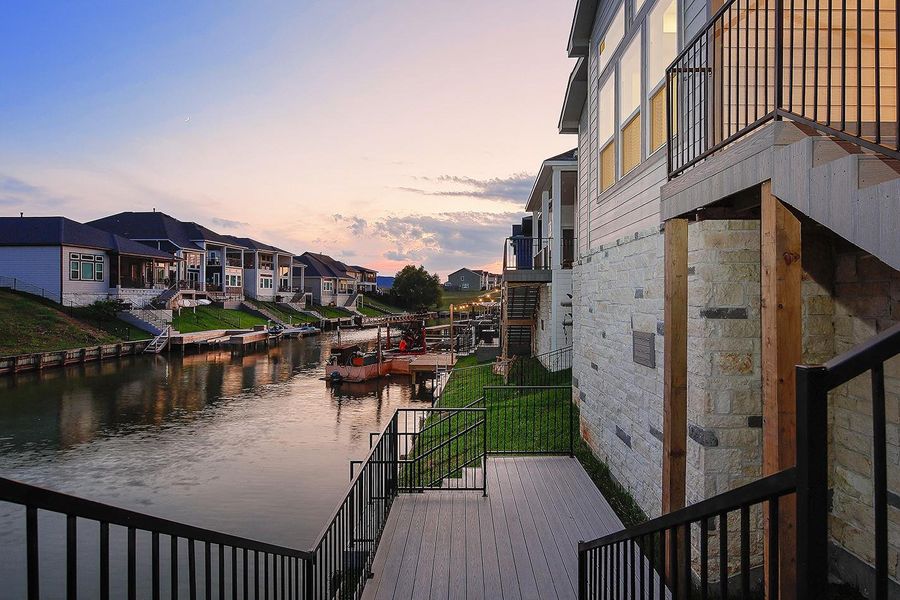 Exterior details and patio area of a home in Lake Breeze, Willis (Image 28).
