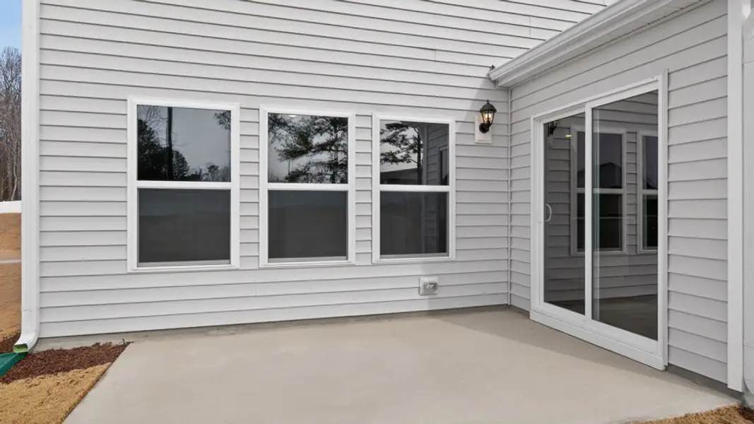 Exterior details and patio area of a home in Wilson's Ridge, Wilson's Mills (Image 2). Exterior details and patio area of a home in Wilson's Ridge, Wilson's Mills (Image 2).