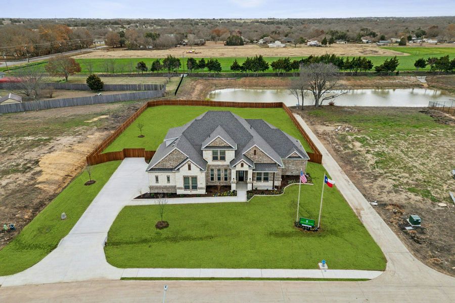 Representative exterior photo of a completed home built from the Reid by Kindred Homes in Heritage, McLendon-Chisholm, TX (Image 20).