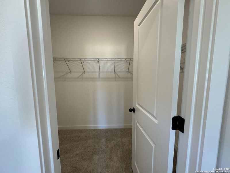 Spacious, unfurnished interior of a new home in Enclave at Hennersby Hollow 50's, San Antonio (Image 26).
