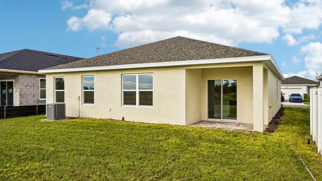 Exterior details and patio area of a home in Willowbrook North, Winter Haven (Image 3).