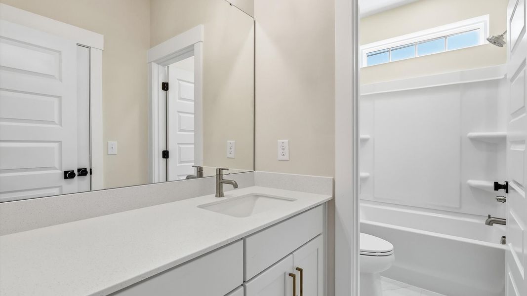 Representative furnished interior of a home built from the Stonehaven  II by DRB Homes in Oak Bend, Charleston (Image 25).