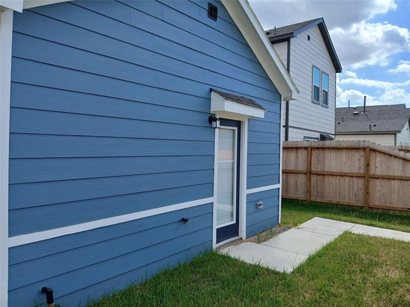 Exterior details and patio area of a home in , Houston (Image 1). Exterior details and patio area of a home in , Houston (Image 1).