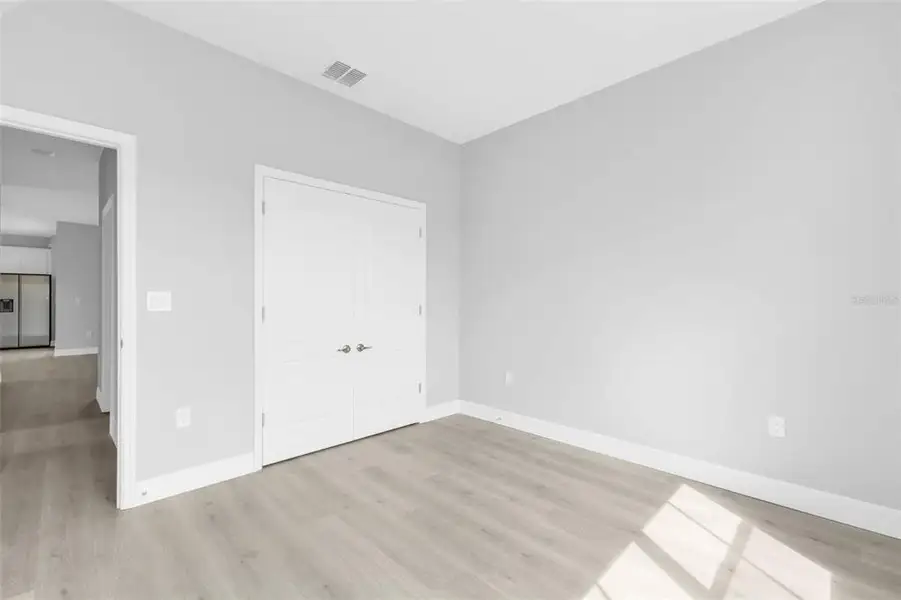 Spacious, unfurnished interior of a new home in , Port Charlotte (Image 18).