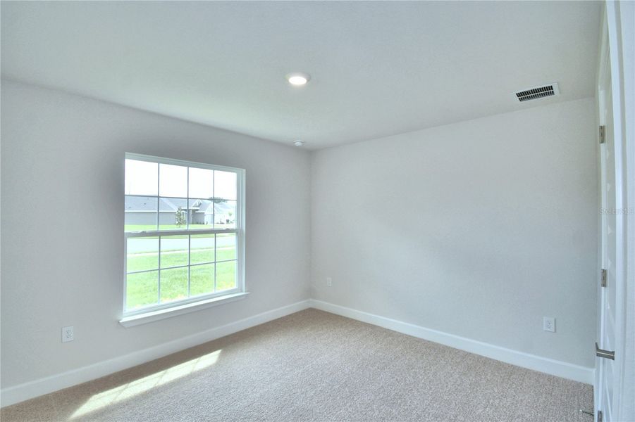 Spacious, unfurnished interior of a new home in Cadence Crossing, Auburndale (Image 23).