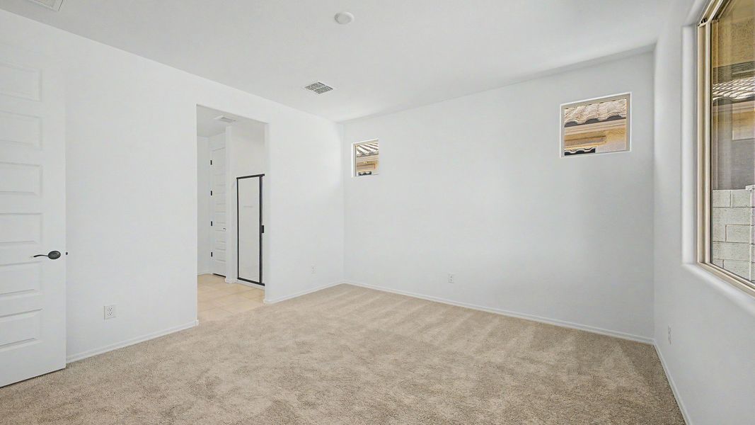 Representative furnished interior of a home built from the Acacia II by DRB Homes in Apache Farms, Buckeye (Image 16).