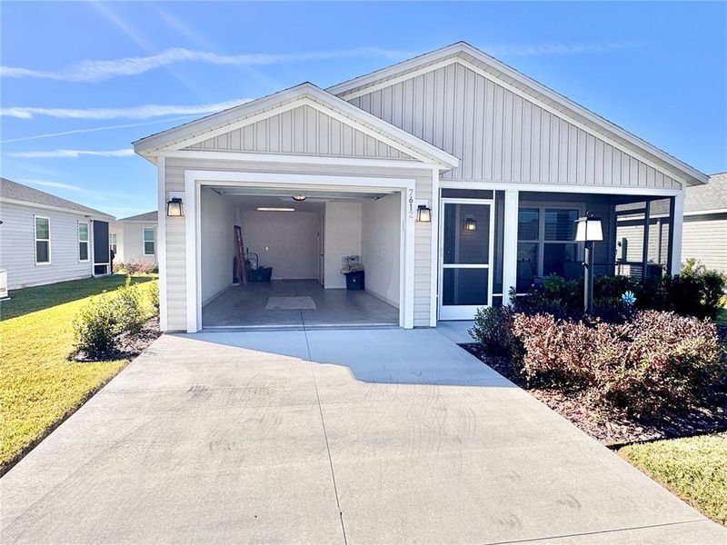 Front exterior of a new home in , The Villages, FL, highlighting curb appeal (Image 2). Front exterior of a new home in , The Villages, FL, highlighting curb appeal (Image 2).