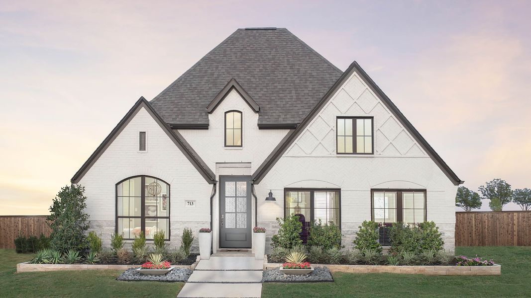 Front exterior of a new home in Meadows of Mill Creek, Seguin, TX, highlighting curb appeal (Image 27).