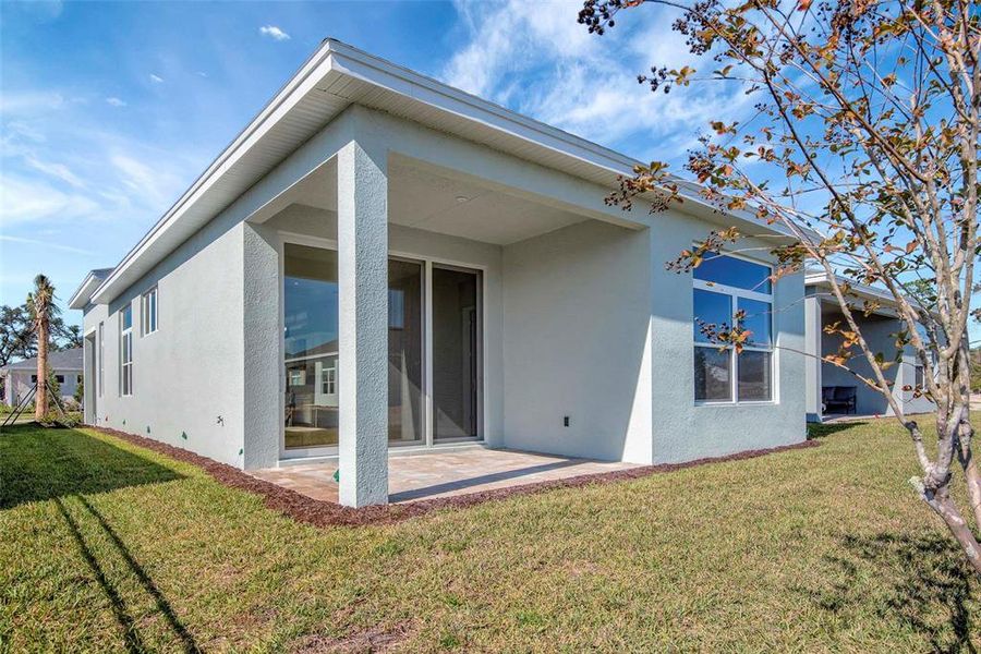 Exterior details and patio area of a home in The Reserve at Victoria, Deland (Image 26). Exterior details and patio area of a home in The Reserve at Victoria, Deland (Image 26).