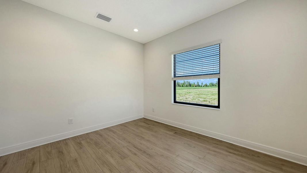 Spacious, unfurnished interior of a new home in Palm Grove Real Estate and Homes for Sale in Lakewood Ranch, FL - Neal Communities, Lakewood Ranch (Image 43).