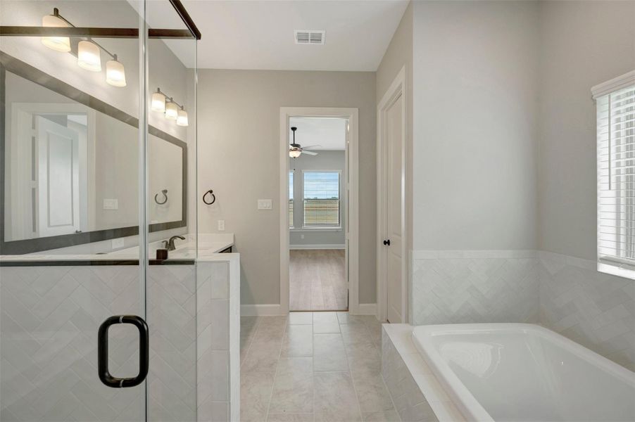 Furnished interior view inside a new home in Prairieland Village - Grove Collection, Cypress (Image 11). Furnished interior view inside a new home in Prairieland Village - Grove Collection, Cypress (Image 11).