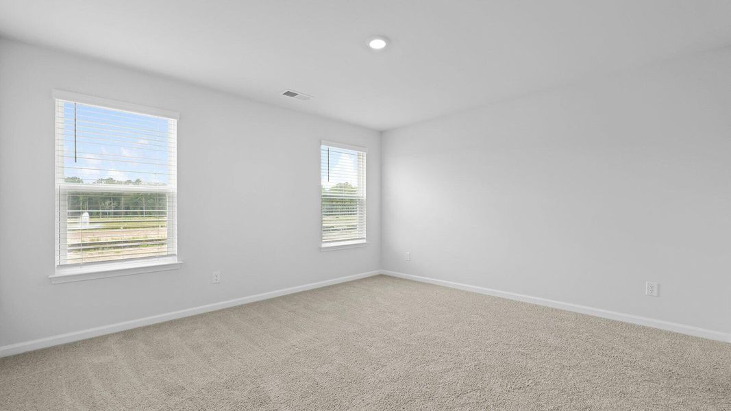 Spacious, unfurnished interior of a new home in Pine Hills Townhomes at Cane Bay, Summerville (Image 28). Spacious, unfurnished interior of a new home in Pine Hills Townhomes at Cane Bay, Summerville (Image 28).