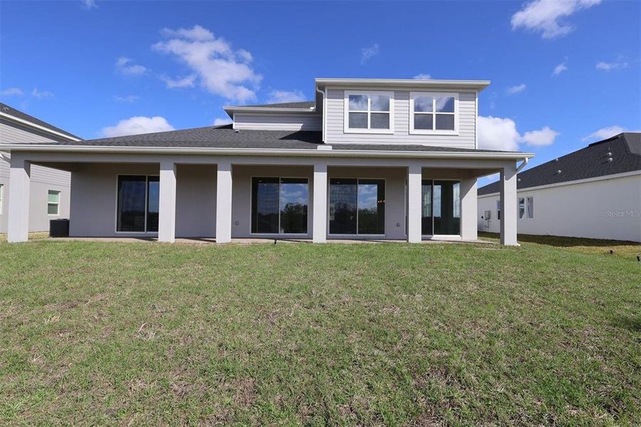 Exterior details and patio area of a home in Wolf Lake Ranch, Apopka (Image 17).
