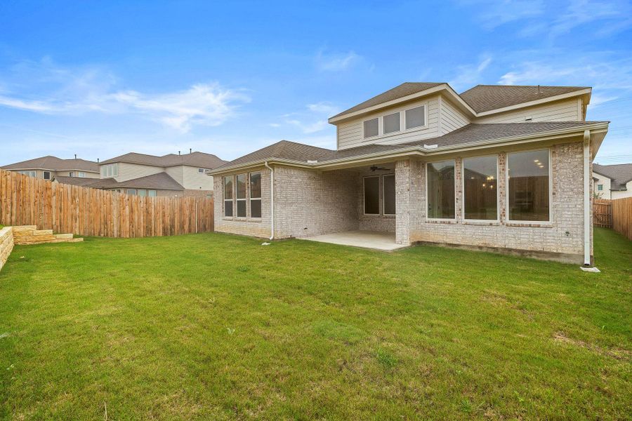 Exterior details and patio area of a home in Blackhawk in Pflugerville, Pflugerville (Image 22).