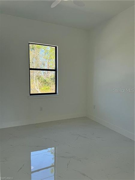 Spacious, unfurnished interior of a new home in , Lehigh Acres (Image 12).