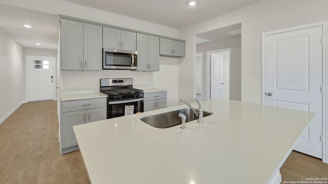Furnished interior view inside a new home in Whisper South, San Marcos (Image 12).