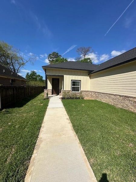 Exterior details and patio area of a home in , Huffman (Image 3). Exterior details and patio area of a home in , Huffman (Image 3).