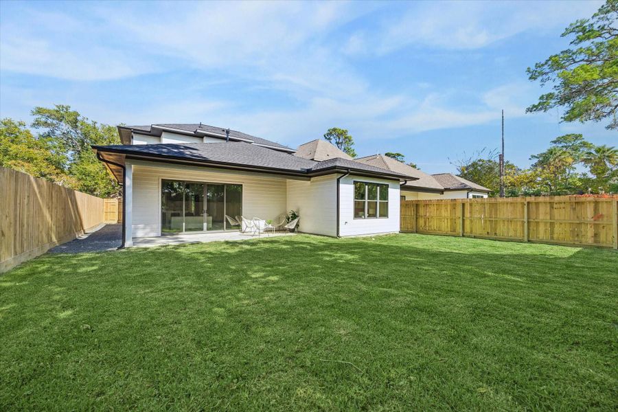 Exterior details and patio area of a home in , Houston (Image 4).