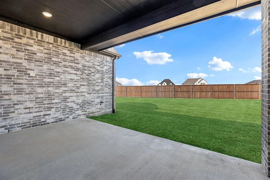 Exterior details and patio area of a home in Sandbrock Ranch, Aubrey (Image 24).