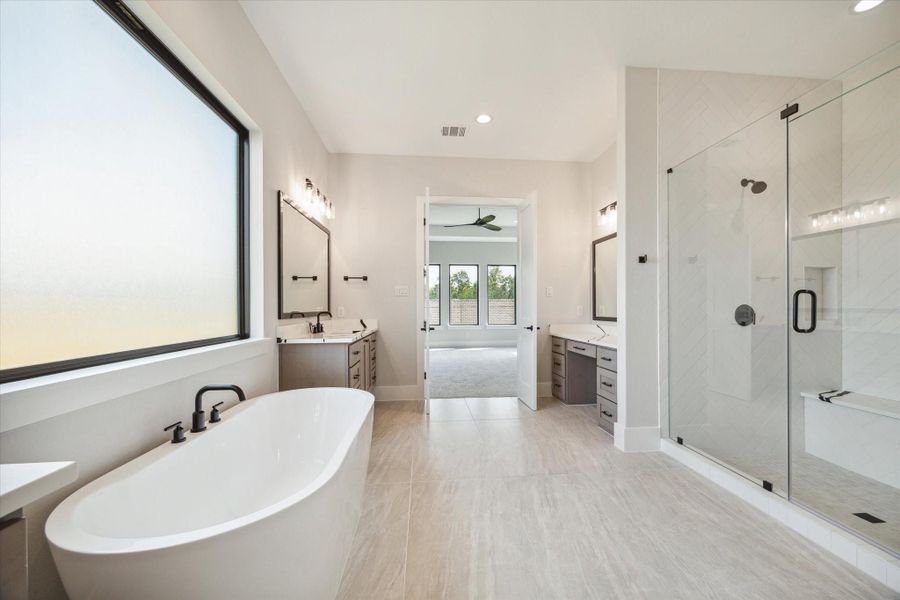 Furnished interior view inside a new home in Sienna - Estates at Summerhouse Lake, Missouri City (Image 7).