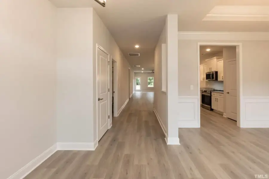 Spacious, unfurnished interior of a new home in East Lake, Leland (Image 12).
